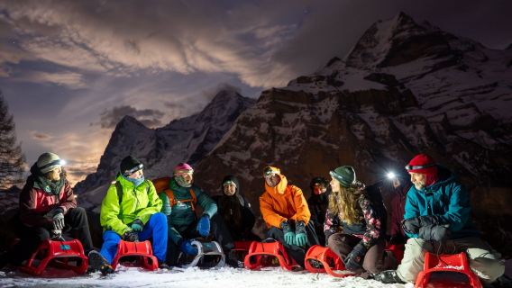 Sunset sledding with fondue from Interlaken