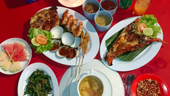 Cena di pesce a Jimbaran con vista sul tramonto