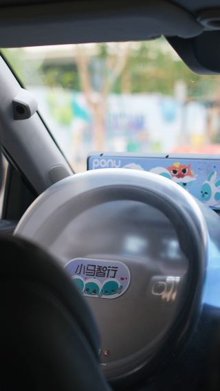 Guangzhou: Self-Driving Robotaxi Experience with Guide