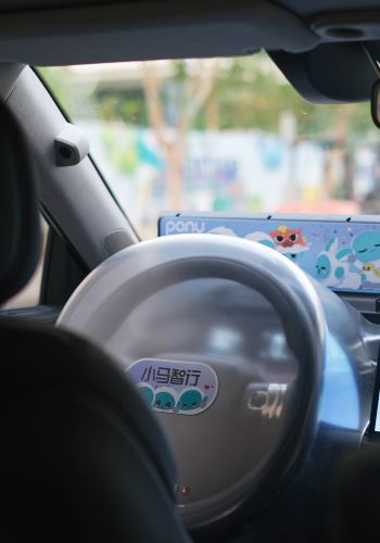 Guangzhou: Self-Driving Robotaxi Experience with Guide