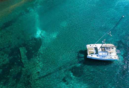 Luxury catamaran sailing boat cruise in Santorini, Greece [year-round operation/includes onboard BBQ + drinks/hotel transfers/optional sunset view...