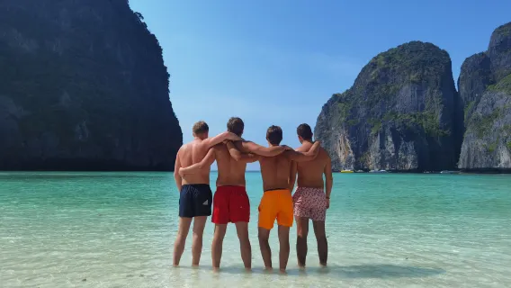 From Phuket: Transfer to Krabi with Phi Phi Longtail Boat Tour