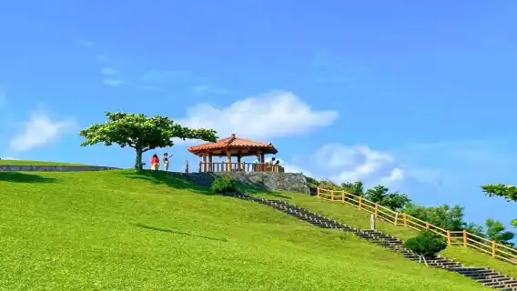 日本沖繩北部萬座毛海洋博公園美國村中文拼團一日遊