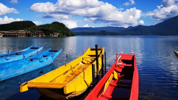 1-day private charter tour to Lugu Lake scenic area from Lijiang [check-in spots: Lugu Lake's Goddess Bay + 360° lakeside tour + dugout canoe]