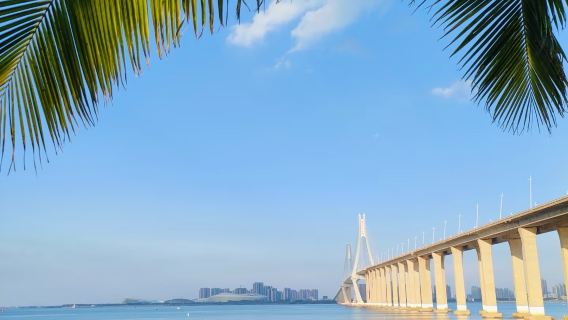 Zhanjiang's must-visit spots in one day: Stroll along Jinsha Bay, explore the Maar Lake, and admire the night view of the Bay Bridge.