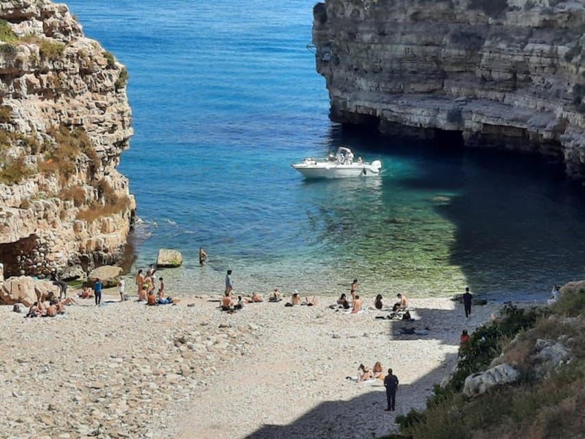 Coast and caves of Polignano: boat tour, drinks, swimming, music, and fun