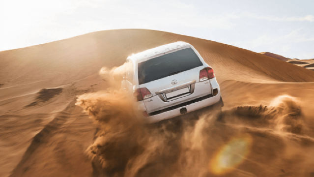 Abu Dhabi Sunrise Sand Rush (Hotel Pickup/Sand Rush/Camel Ride/Sandboarding/Drinks)