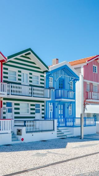 Half-day tour to Aveiro + Costa Nova in Portugal with canal cruise experience | Round-trip from Porto