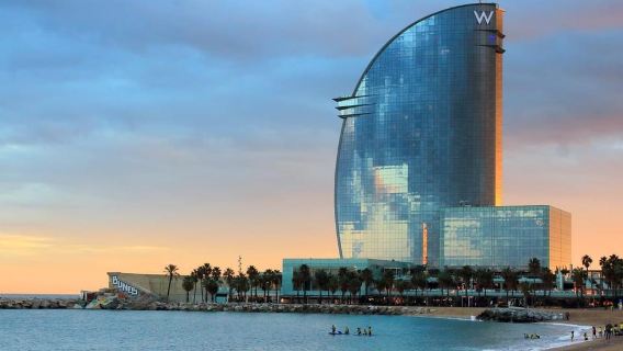 Barcelona: Paddle-Surfen bei Sonnenaufgang oder Sonnenuntergang mit Fotos