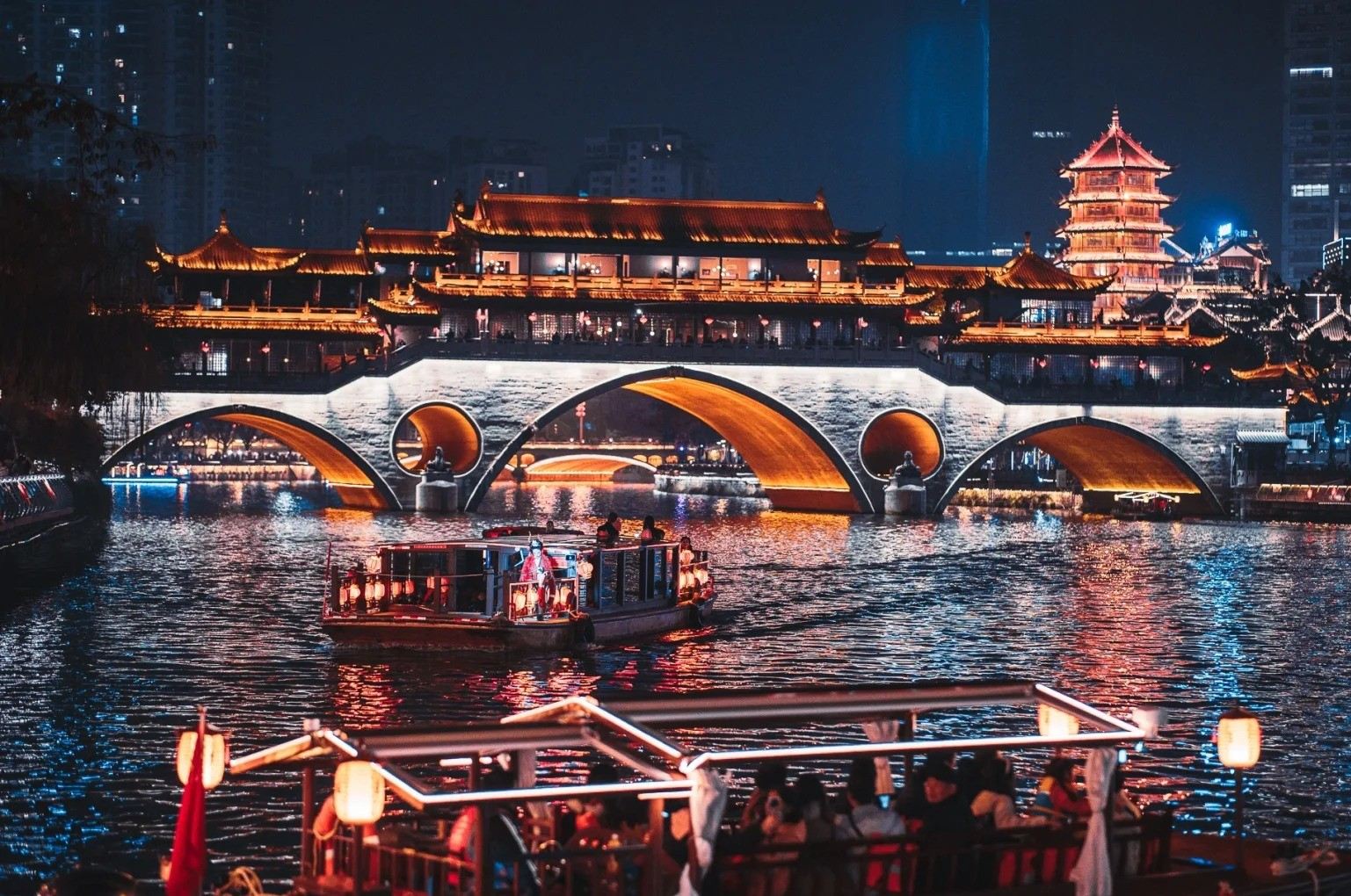 Chengdu Jinjiang Cruise: A must-visit night attraction, showcasing the city's iconic skyline by boat