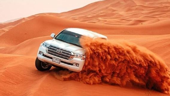 Safari VIP sulle dune rosse con cena barbecue con pick/drop e giro in cammello sulla sabbia.