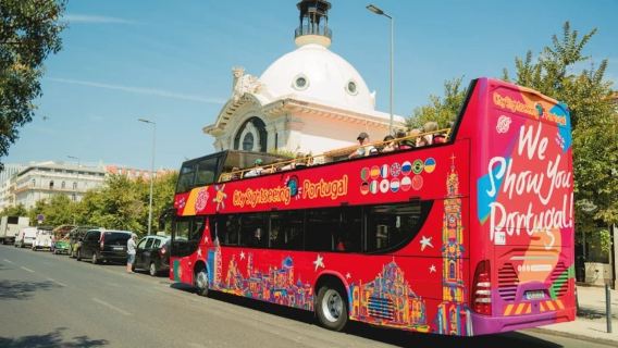Lisbon CitySightseeing tour bus (panoramic view from high ground + Tagus River scenery + old town district stroll)
