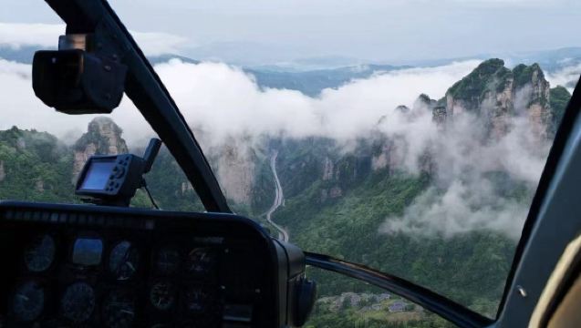 Zhangjiajie Helicopter Flight Experience (Aerial Adventure · Marvel at Zhangjiajie's Wonders + Helicopter Soaring Over Majestic Peaks and Waters + Cloud-Level Flight Over Fairyland Zhangjiajie)