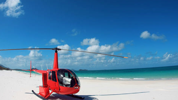 Whitsunday Islands helicopter sightseeing for 2 (aerial view of Heart Reef with stopover at Whitehaven Beach, window seat)