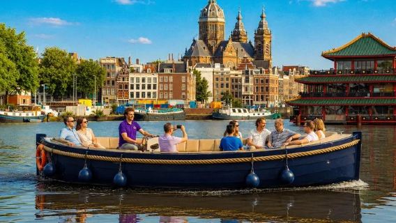 Crucero por los canales de Ámsterdam + entrada combinada al Museo Moco | Audioguía digital en 7 idiomas