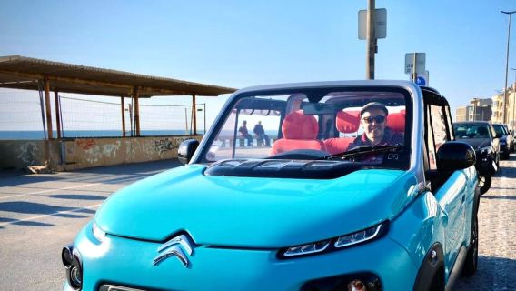 Porto: a ride along the coast in a fun eco-friendly car