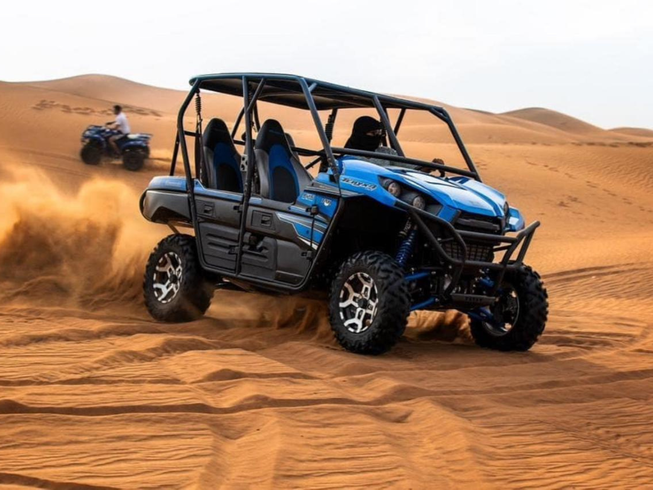 Premium Desert Safari with Quad Bike Dune Bashing, Camel Ride, BBQ Dinner, Live Shows
