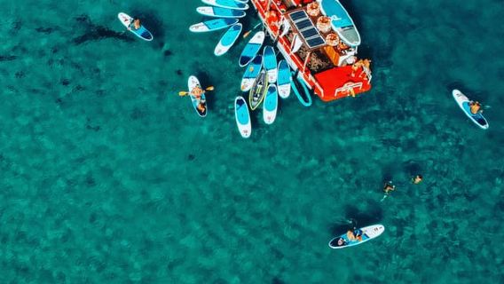 Ibiza: Secret Coves Guided Boat Tour with Open Bar and Tapas