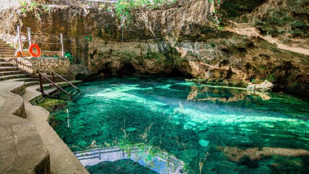 Cancun: Cenotes El Retoño entrance with transport, food, and guided tour.