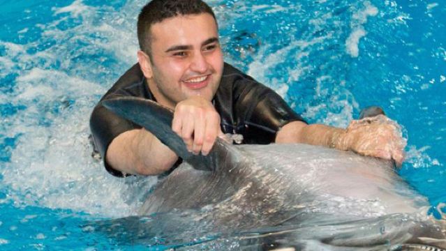 Dubai Attraction: Dolphin Bay Atlantis