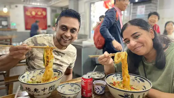 City Wall Cycling + Xi'an Muslim Quarter Food Exploration by Tuk-Tuk + Big Wild Goose Pagoda (by Ride-Hailing)