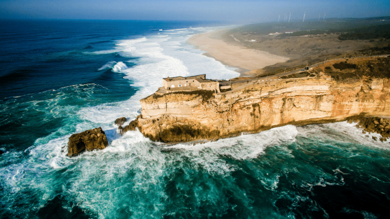 From Lisbon: Tour to Óbidos and Nazaré - Medieval Village, Ginja, and Surf Museum