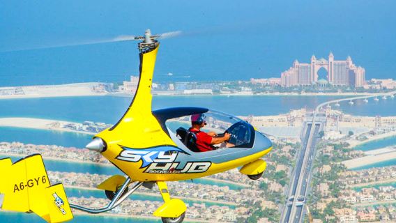 Pemandangan udara 360Β° Palm Jumeirah Dubai dari gyroplane, termasuk video, foto dan perspektif terjun udara.