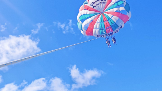 Paragliding experience in Naha Okinawa or northern areas & 360° aerial views & professional instructors ensuring safety throughout