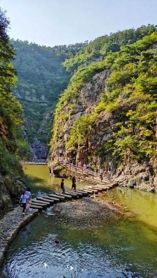 1-day tour to Jiuxianshan Scenic Spot, Xingdao Peach Blossom Island, Couple Peak, and Wanpingkou Scenic in Rizhao, Shandong with bilingual service (Chinese/English)