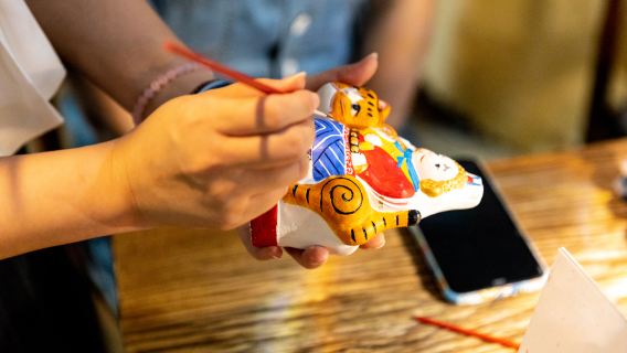 Experience the traditional Beijing Lord Rabbit(Figurine) Painting and Heritage, and taste the host's homemade Fried Noodles (Halal)