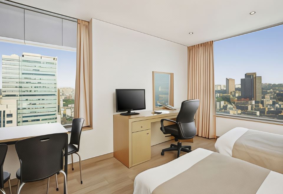 현대레지던스 객실 내 주방 또는 거실 이미지