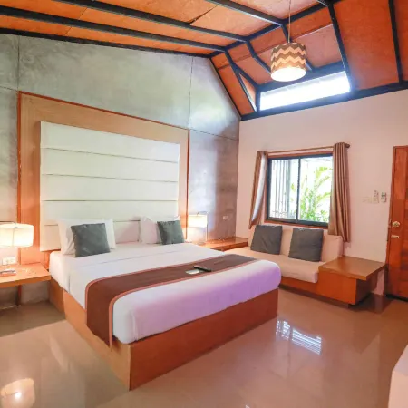 Panwana Resort Отели рядом с достопримечательностью «Мае Рампхуенг Бич»