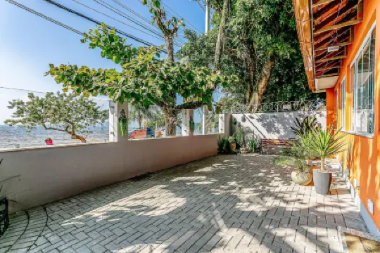 Apartments and Studios Facing Lagoa da Conceição Sdr Отели рядом с достопримечательностью «Lagoa Sandboard»