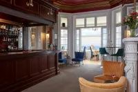 Luccombe Manor Country House Hotel - bar