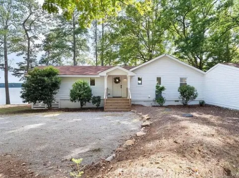 Newly renovated beauty on main lake with sunrise to sunset panoramic views!