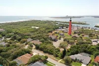 Watch the Dolphins play in the Atlantic while the gentle waves roll in. Hotels in Ponce Inlet