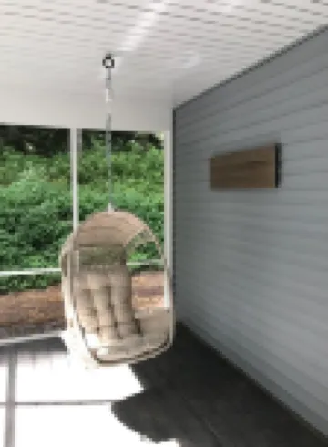 Peaceful cabin in our private woods, close to bike trail, winery, and lakes.