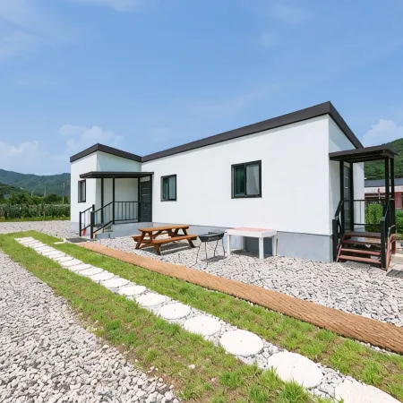 Gangneung Pogni Отели рядом с достопримечательностью «Парк Hourglass»