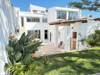 Luxury Villa Steps from the Beach | Heated Pool, Ocean Views & Rooftop Lounge