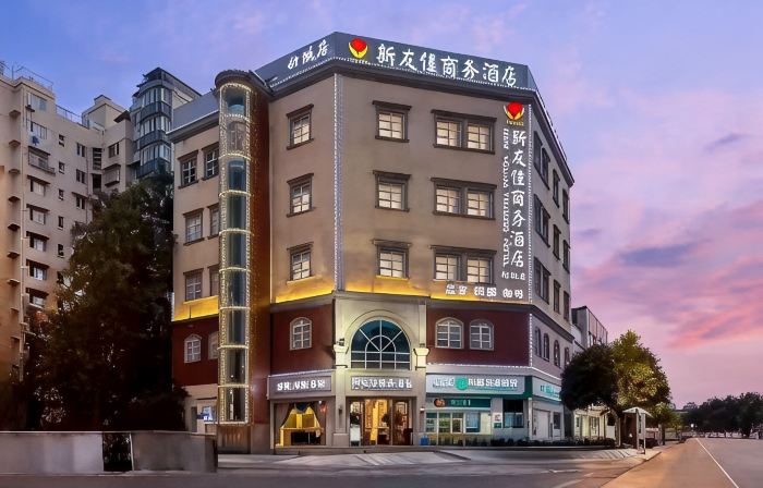 Youjia Traders Hotel (Pengzhou Longxing Temple)