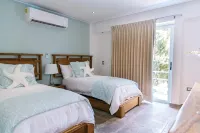 Luxury Beach Villa Ideal for a Multi-Family Stay in Playacar – 4BR – 2 Families