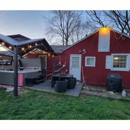 The White House w/ Hot Tub Portage Lakes Fenced Yard Pet-Friendly!