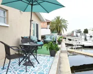 Unique waterfront home, Hot Tub, private boat dock,  walk to beach, pet friendly