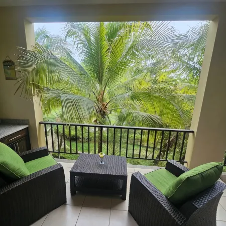 Spacious Pacifico condo-large balcony.  Access to pool, jacuzzi with bar/grill