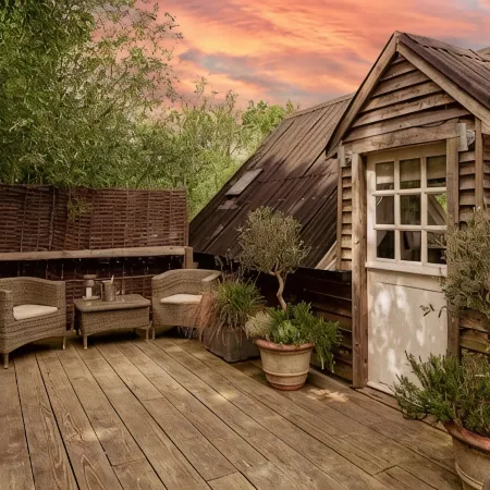 Lofty first floor barn conversion in stunning secluded setting.