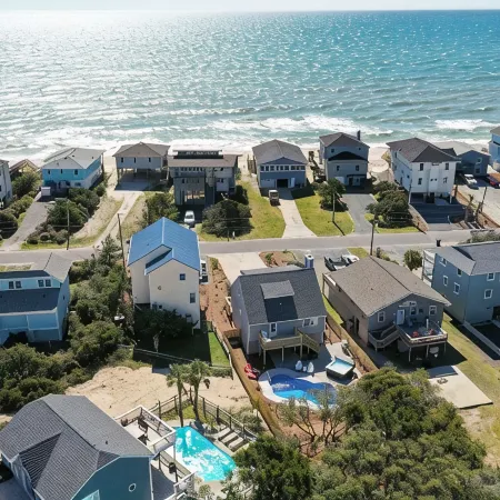 Your Ultimate Retreat – Steps from Beach with Pvt Heated Pool, Slide & Hot Tub!