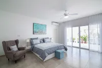 Stunning Penthouse on Mullet Bay beach - gimnasio