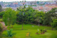 Utalii Hotel Hotels near Miniso TRM