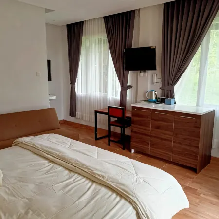 NK Villa Syariah and Cafe Prigen