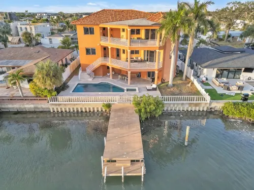 Indulge in Luxury at This Expansive Three-Story Waterfront Retreat. - Private Pools